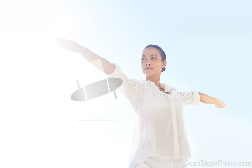 Image of Sky, sunshine and woman doing yoga for exercise, stress relief and outdoor wellness for morning fitness. Balance, summer flare and female yogi doing pilates performance, workout or training routine