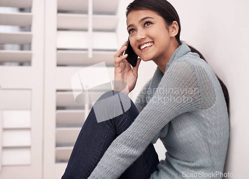 Image of Young woman, phone call and communication with smile at home, conversation and happy for technology and connectivity. Contact, smartphone or cellphone with connection, discussion and network for talk