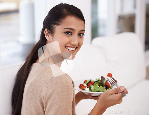 Image of Happy woman, portrait and salad bowl for diet, nutrition or healthy snack sitting on sofa at home. Face of female person smile in relax with mixed vegetables, vitamin or meal for weight loss at house