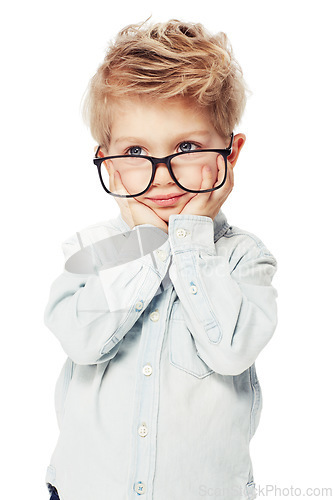 Image of Child, boy and frame for glasses or eyecare in studio, lenses and vision health for eyesight. Male person, kid and optometry or assessment for eye wellness, fashion spectacles and white background