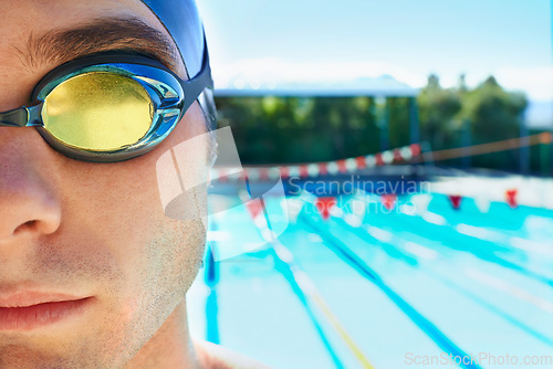 Image of Swimming goggles, sports and portrait of man for pool exercise, outdoor workout or training practice. Commitment, poolside and face of waterpolo player for competition, fitness or cardio performance