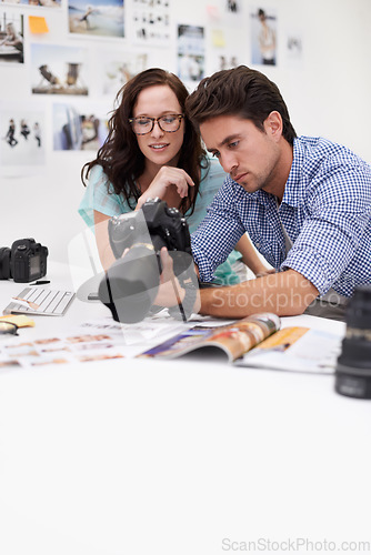 Image of Camera, studio and photographers team editor in an office or workshop for production. Creative, photography and young artists with dslr equipment for editing pictures inspection in modern workplace.