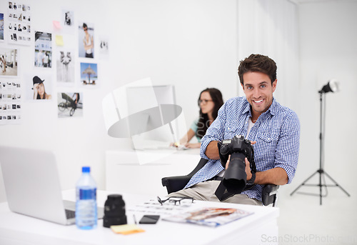 Image of Man, camera and stock photography in portrait, checking image design and creative in workplace. Person, smile face or happy in production career, technology or focus in office with digital graphic