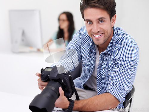 Image of Man, photographer and portrait with camera, happy and lens for work, shoot and editing photographs. Professional, office and technology with creativity, internet and equipment for videography