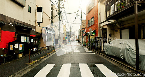 Image of Cityscape, street and crosswalk for safety, walking and commute for transport in urban location. Road, sidewalk and pedestrian crossing in metro traffic for moving, infrastructure and outdoor travel