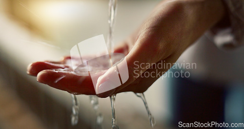 Image of Closeup, wash hands and water for cleaning, hygiene and health for safety, immune system or germs. Person, splash and drop of liquid for wellness, zoom and stop bacteria in home for body in Tokyo