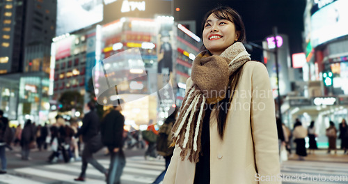 Image of Night, walking and young woman in the town for exploring on vacation, adventure or holiday. Happy, travel and beautiful Asian female person by public transport for sightseeing on weekend trip in city