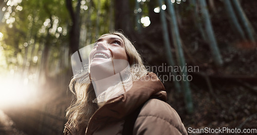 Image of Nature, hiking and happy woman travel in forest on vacation, holiday or tourism in Japan. Smile, woods and an excited person outdoor in environment, park and explore on adventure for freedom in Tokyo