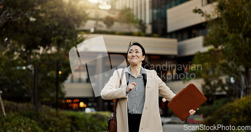 Image of City, business and woman with celebration, walking and achievement with winner, promotion and excited. Japan, person and worker with b2b deal, victory and winning with documents, bonus or happiness