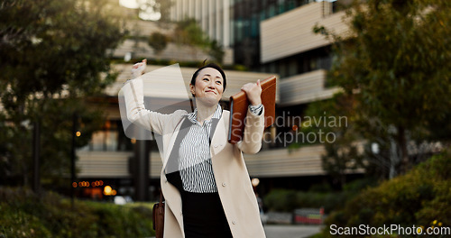 Image of City, business and woman with celebration, dancing and achievement with winner, promotion and employee. Japan, person or entrepreneur with b2b deal, victory or bonus with energy, freedom or happiness