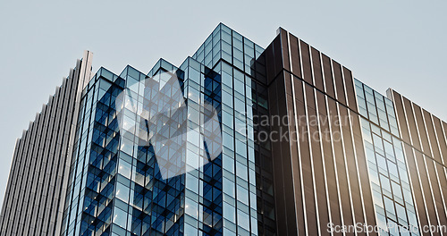 Image of Building, skyscraper and city or window apartment in urban Tokyo or infrastructure, architecture or development landscape. Cityscape, modern and business office or housing, structure or accommodation