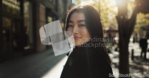 Image of Smile, portrait and Japanese woman in city for tourist sightseeing in the street on weekend trip. Happy, adventure and young female person commuting for travel in road of urban town in Kyoto Japan.