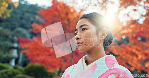 Image of Woman in park, Asian and peace, thinking about life with reflection and tranquility in traditional clothes. Travel, Japanese garden and nature for fresh air, inspiration or insight with floral kimono