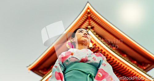 Image of Woman, Japanese shinto temple and traditional clothes for culture, building or religion in sunshine. Person, ideas and vision for buddhism with faith, mindfulness or thinking with low angle in Kyoto