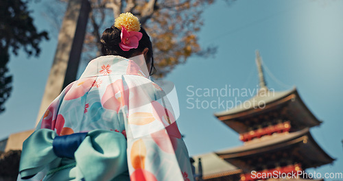 Image of Woman, shinto temple and back with traditional clothes in culture, building or religion with vision for zen balance. Japanese girl, idea and buddhism in faith, mindfulness or walk on journey in Kyoto