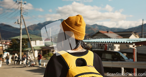 Image of Asian, woman at train station and travel, back view on commute or holiday and freedom outdoor. Railway, walking on platform and transportation, journey for adventure in China and weekend trip