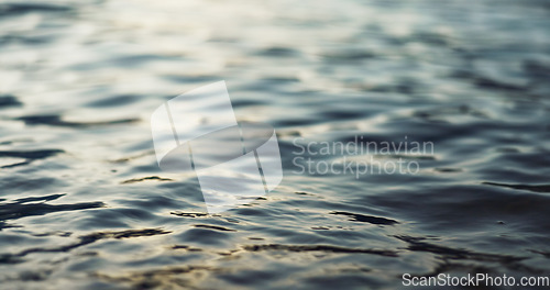 Image of Water, ripple and nature with environment and lake, river or ocean with waves, calm and closeup. Earth, sea and natural background, moving liquid is tranquil and abstract with texture and light