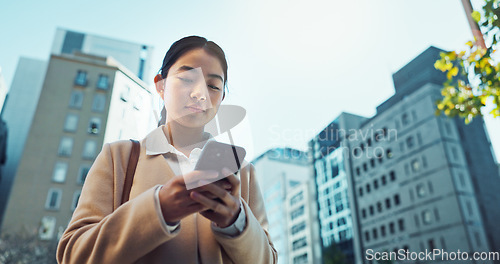 Image of Happy woman, phone and walking in city for communication, social media or outdoor networking. Young female person smile on mobile smartphone for online chatting, texting or research in an urban town