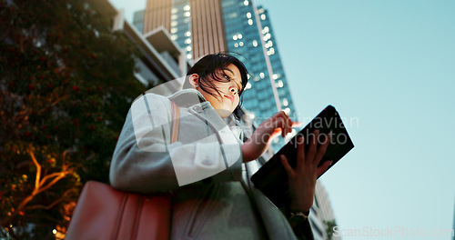 Image of Asian woman, tablet and city for communication, research or social media by building in Japan. Female person or employee on technology for online search, chat or outdoor networking in an urban town