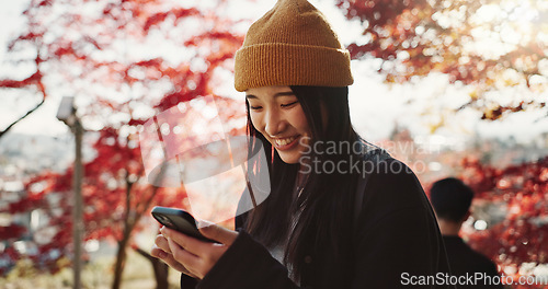 Image of Selfie, travel and Japanese woman in forest for holiday, vacation and adventure in Japan. Happy, smile and person take picture on smartphone in nature for social media post, memories and online blog