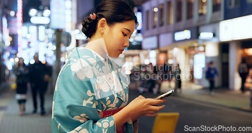 Image of Street, Japanese woman and smartphone with typing, internet and social media with traditional clothes. Person, outdoor and girl with a cellphone, mobile user and contact with network and digital app