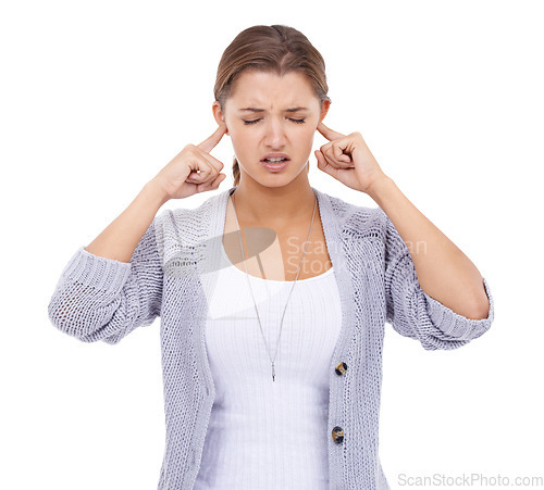 Image of Noise, stop or woman with fingers in ears in studio for volume control, sensitive or block on white background. Annoyed, frustrated or model with not listening sign, complaint or stressed by tinnitus