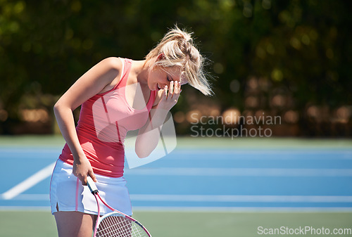 Image of Frustrated woman, tennis and headache in mistake, fail or loser on outdoor court for game or match. Upset or disappointed young female person, athlete or player in loss, stress or burnout in nature