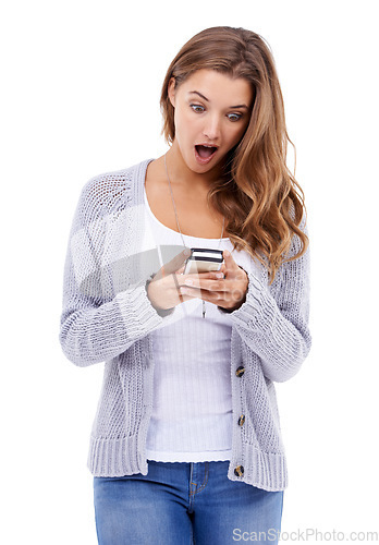 Image of Wow, surprise and woman with phone in studio for social media, notification or hacker alert on white background. Smartphone, omg and female model with app for unexpected text, message or fake news