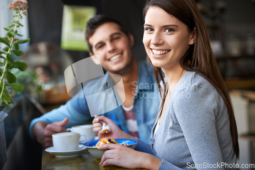 Image of Smile, portrait and couple eating in cafe, love and bonding together on valentines day date in the morning. Happy face, man and woman in restaurant with breakfast coffee drink, food and relationship