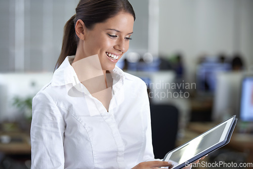 Image of Professional woman, reading on tablet and workspace for information technology, planning and software management. Business leader or manager with digital research for programming results in office