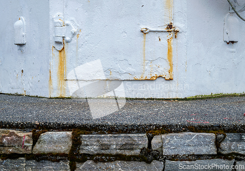 Image of Weathered Wall With Rust Stains and Peeling Paint Close-Up on Ov