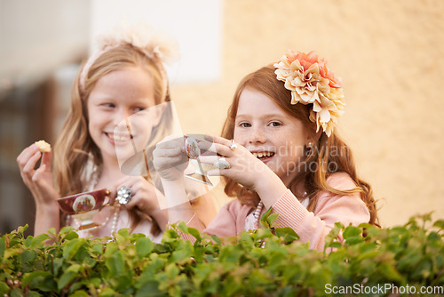 Image of Girl, friends and tea cup in garden for party snack for happy dress up game, fantasy or play. Female people, nature and hot drink in backyard for summer bonding fun or lunch, birthday or beverage