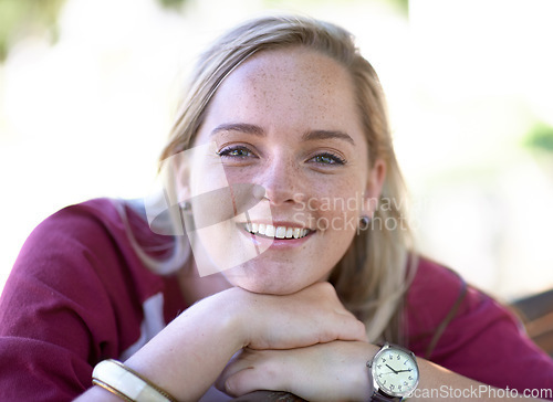 Image of Portrait, student and smile of woman at park, university campus or outdoor. Face, college and happy blonde girl, beauty and young person in education for learning to study at school in Switzerland