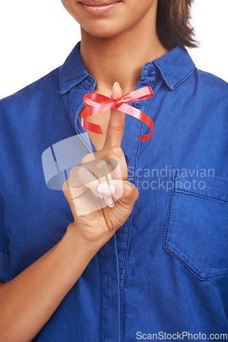 Image of Red, ribbon and bow on finger for reminder of event, commitment or sign remember a task. Attention, symbol and icon on hand to notice date of appointment or helping to alert memory of person