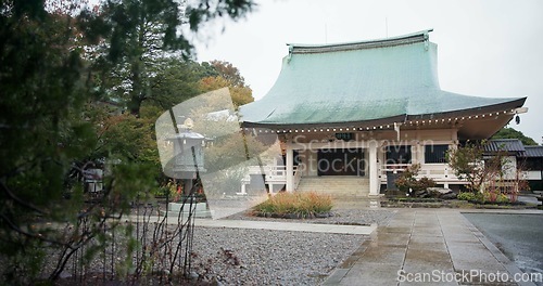 Image of Buddhist temple, japan and worship by culture for religion, praise and prayer building in town. Japanese architecture, spiritual hope and travel in peace in zen, meditation and wellness in tokyo city