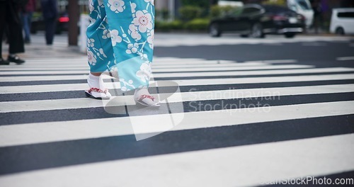 Image of Japanese woman, feet and travel in kimono in city, journey and wellness for heritage celebration. Person, steps and traditional clothes in tokyo for holiday and pedestrian crossing in japan fashion