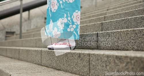 Image of Feet, stairs and person in Japanese kimono for travel, tourism or Tokyo sightseeing closeup. Sandals, steps and culture with tourist outdoor in clothes for tradition, vacation or holiday adventure