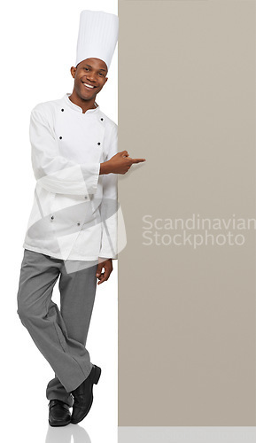 Image of Billboard, portrait and black man chef with hand pointing to studio for checklist, menu or space on white background. Bakery, presentation or baker face with food tips poster, guide or steps mock up