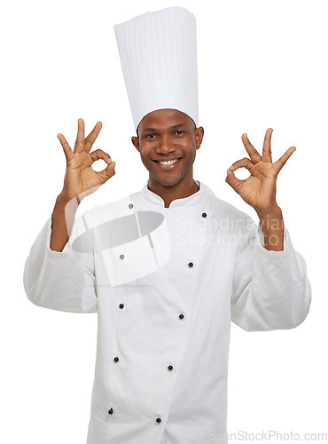 Image of Man, chef and portrait with okay sign, culinary expert and confident guy on white studio background. African person, professional and mockup space with career, food industry and employee with uniform