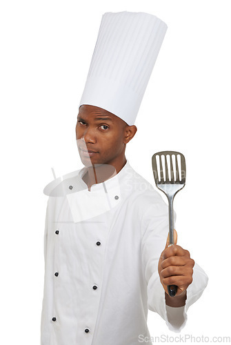 Image of Man, chef and portrait with spatula tool in studio isolated on white background. Face, professional cook and kitchen turner, metal or utensil for serious African restaurant worker in catering service