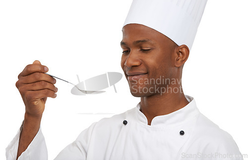 Image of Portrait, african chef and spoon to taste in studio, cooking and hospitality career and happy of dish in restaurant. Black man, smile and pride in creative recipe and catering job by white background