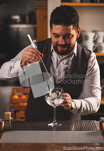 Image of Barman is making cocktail