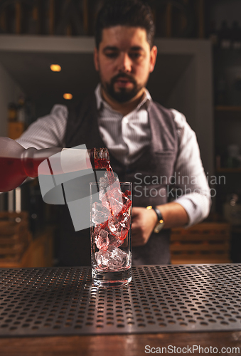 Image of Barman making cocktail