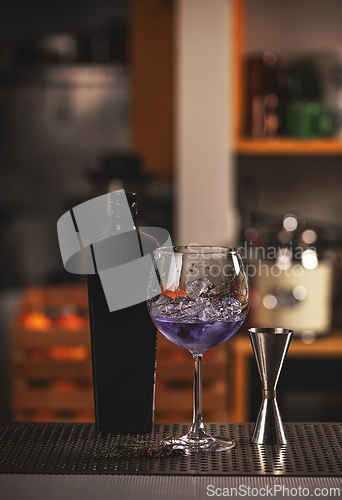 Image of Violet gin in balloon glass