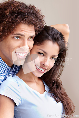 Image of Couple, commitment and hugging in studio, love and bonding in relationship on brown background. Happy people, loyalty and support in embrace, security and trust in marriage or care in partnership