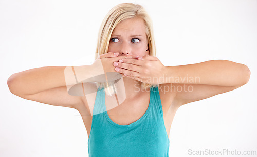 Image of Surprise, secret or woman cover mouth and thinking about announcement in studio on white background. Wow, shocked and girl with wtf, fake news or omg expression for gossip, mistake or crazy news