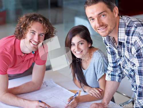 Image of Teamwork, blueprint or portrait of creative people in meeting for development or architecture in startup. Happy engineers, smile or designers planning floor plan strategy, project or problem solving