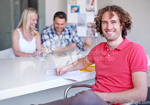 Image of Happy man, coworking or portrait of creative entrepreneur writing notes or ideas for business. Face, confident designer and male employee at desk working at startup job or career at company or office