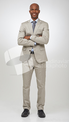 Image of Businessman, portrait and professional confidence in studio as law attorney for corporate trust, career or white background. Black person, arms crossed and face or job pride, employee or mockup space