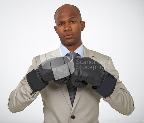 Image of Businessman, portrait and boxing gloves for corporate competition for opportunity, rival or victory. Black man, face and confidence to fight for promotion in studio white background, career or mockup
